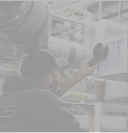 Apprentice testing HVAC system